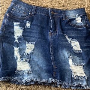 Dark blue ripped mini skirt